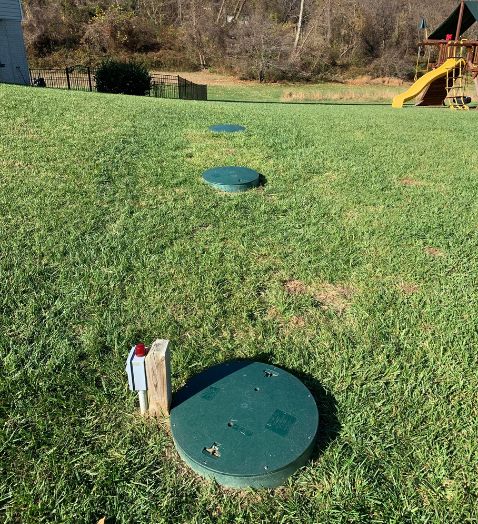 lid of septic tanks on grass edgewater md